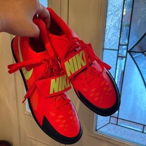 Nike Red Throwing Track Shoes with Neon Yellow Swoosh